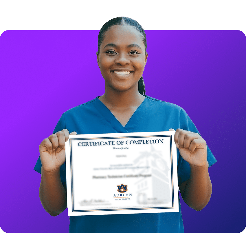 Happy student holding certificate of completion from Auburn University after completing Preppy program.